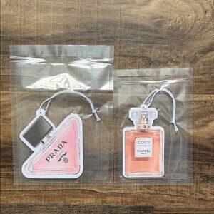 Car Luxe Set of 2 Designer Inspired Air Fresheners. New, Sealed in plastic.